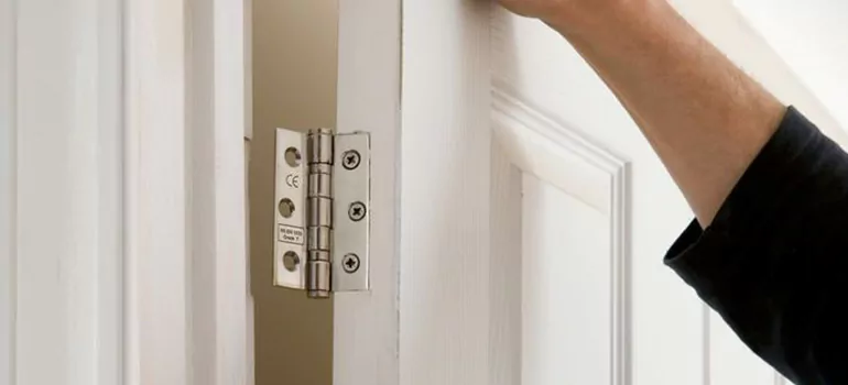 Bathroom Stall Door Hinge Repair in Calgary, AB